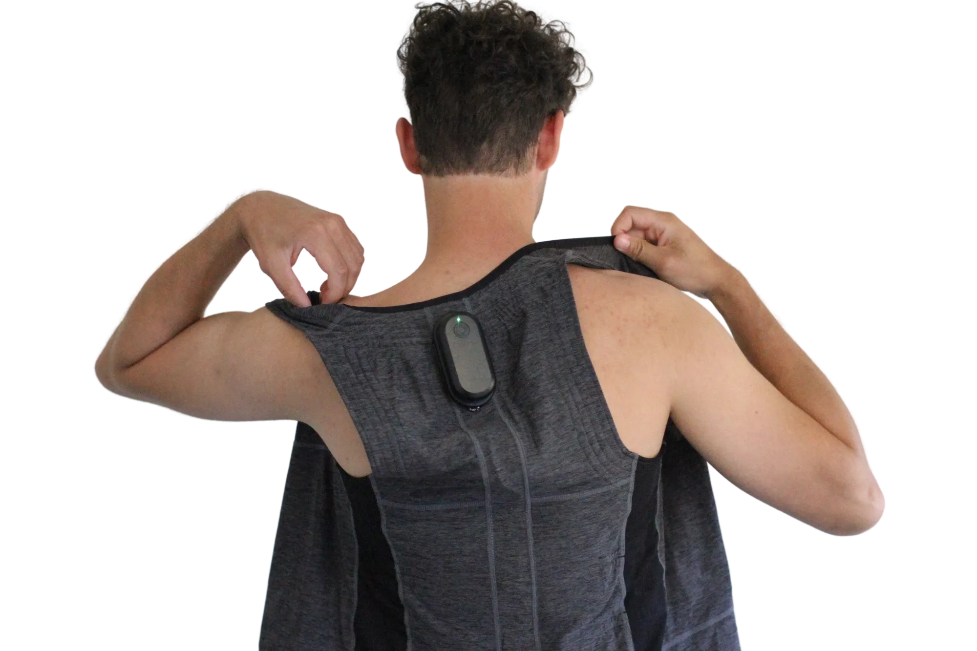 A man pulls on the Precure measurement vest, with the MLI® Back sensor between his shoulder blades
